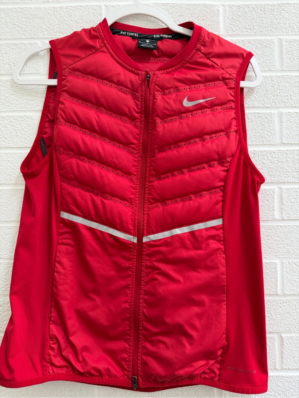 Nike Red Women's Sleeveless Puffer Vest with Reflective Accents